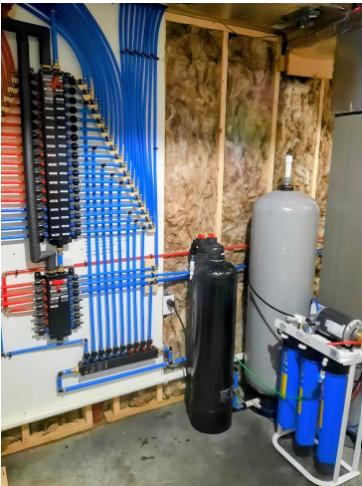 Water softener installation with manifold